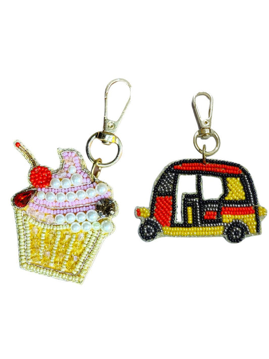 An exceptional blend of cupcake charm and autorickshaw bag charm —a truly singular combination.