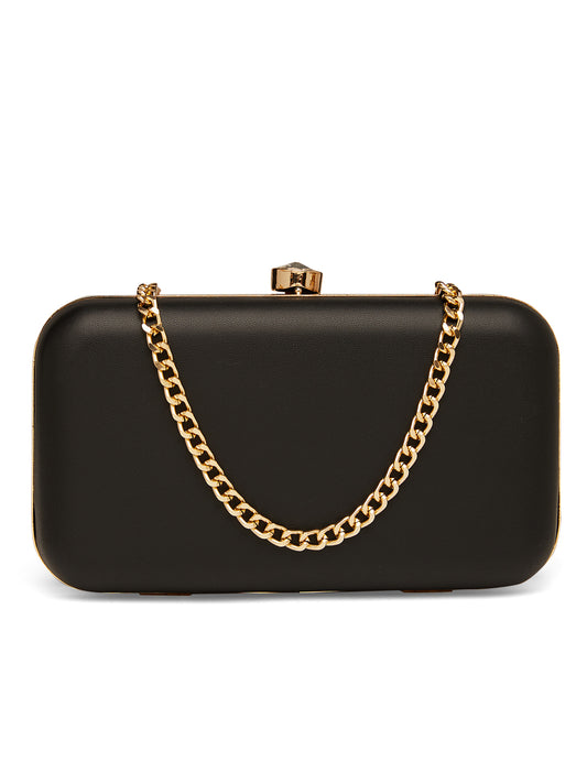 The contrast between the black and the shimmering gold chain creates a striking visual appeal, enhancing the overall allure of the clutch.