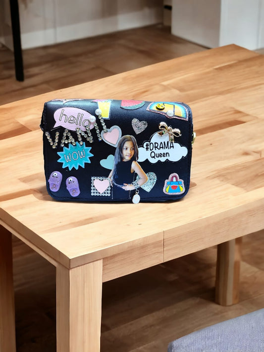 A Vdesi customized flip bag in which you can add your image, name or stickers of your choice. 