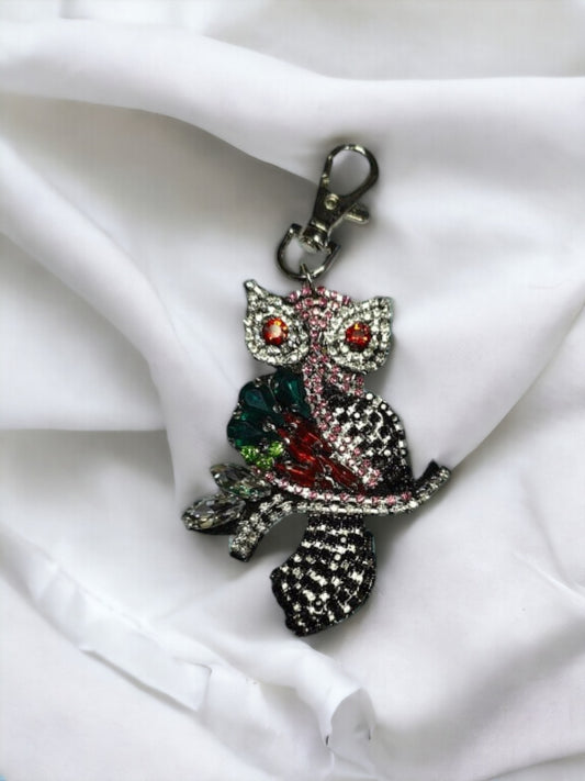 A Vdesi Owl bag charm on a plain white background. 