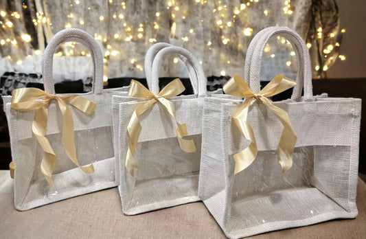 A Beige colour transparent jute shopping bag perfect for festive season. 
