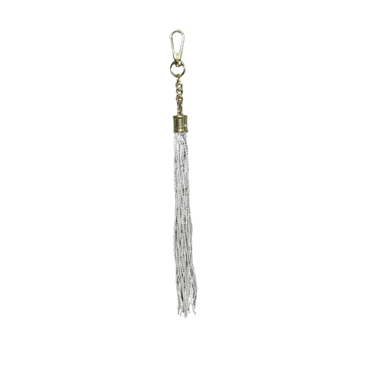 A silver gold sequin bag charm that will ensure that you stand out wherever you go. 