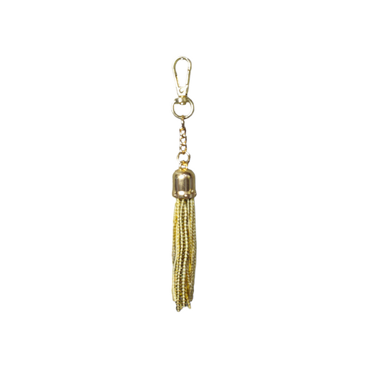 A gold sequin charm will help you to stand out & elevate your style game. 