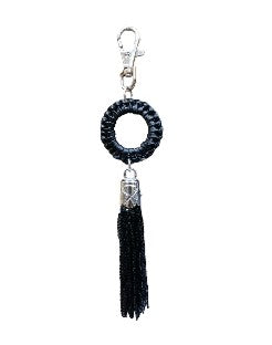 A black sequin tassel charm which is glamorous and chic, it adds instant style to any handbag.
