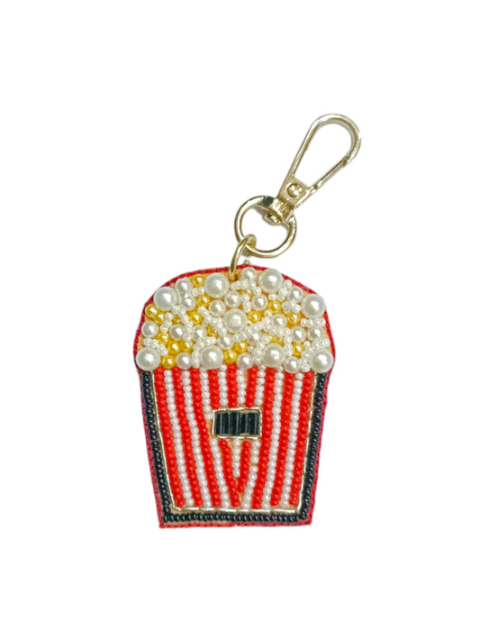 A colourful popcorn bag charm which is playful & spark joy wherever you go. 