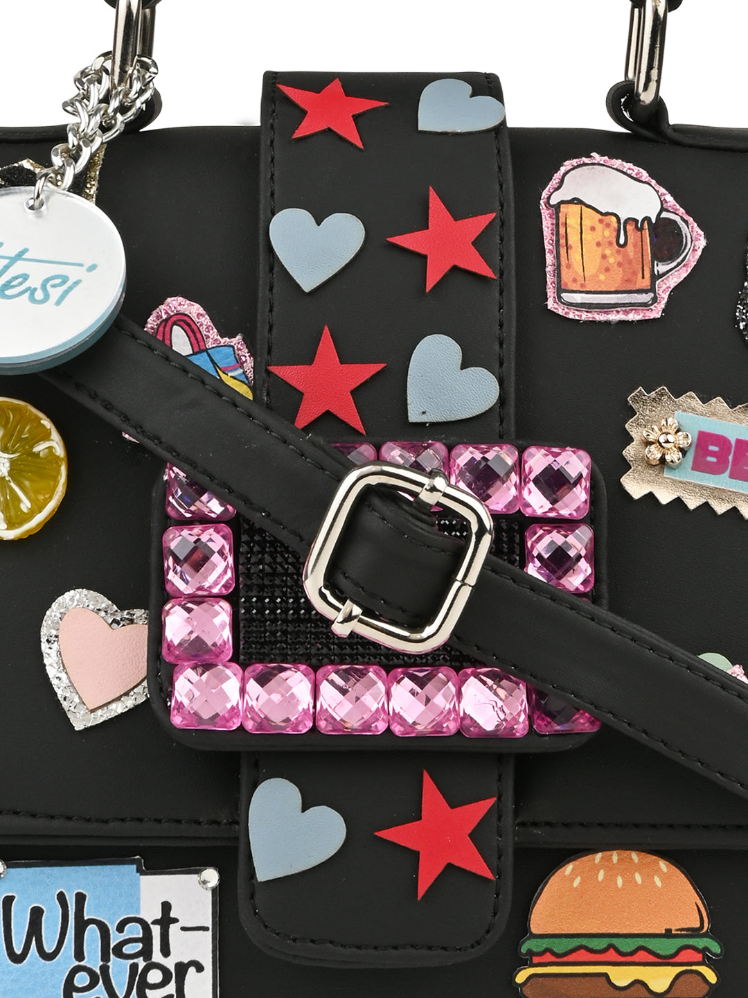 A Black pop badges belt sling bag with a lot of stickers on it, made of PU material and featuring multiple compartments, by Vdesi.