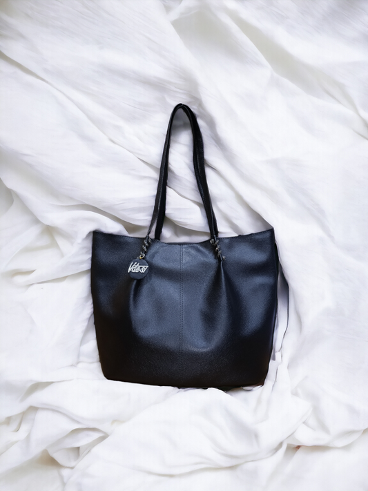 Introducing our classic Tote Bag – the epitome of timeless style and practicality. 