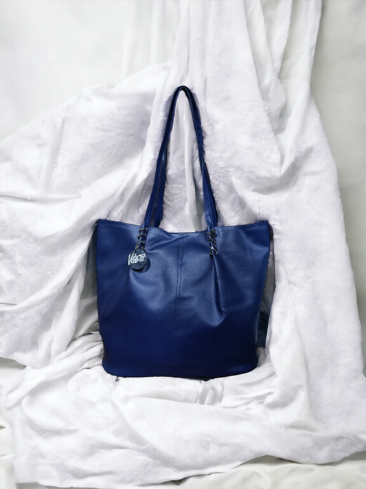 Whether you're running errands or heading to the office, our Tote Bag keeps you organized and on-trend with ease.
