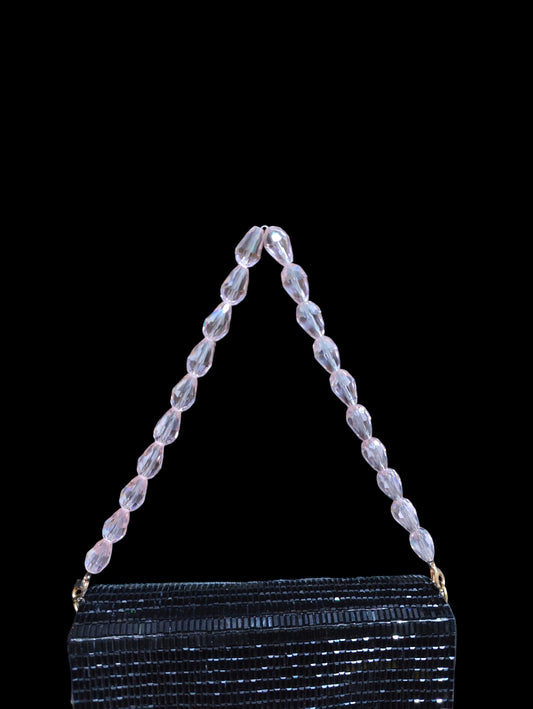 Add a touch of elegance to your look with Vdesi's glass crystal handle that can be attached to a bag, purse or a clutch. 